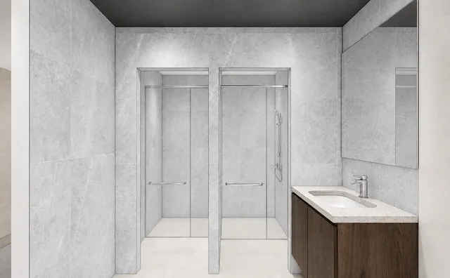 Render of the shared shower room with individual cubicles